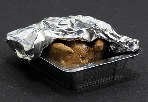 Foil Covered Chicken in a Pan