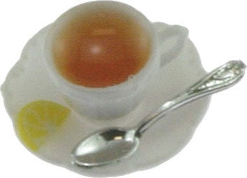 CUP OF HOT TEA W/LEMON ON SAUCER W/SPOON