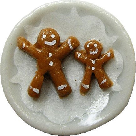 Two Gingerbread Men on a Plate