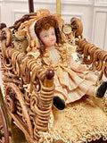 B J Ruemeli Wicker Stroller with Doll