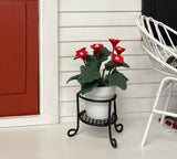 Floor Container with Potted Red Flowers