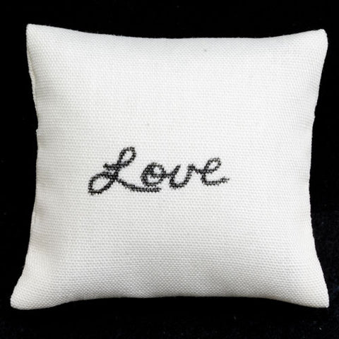 Ecru Pillow with Black Writing, Love