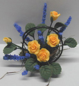 Yellow Roses in Black Wire Basket