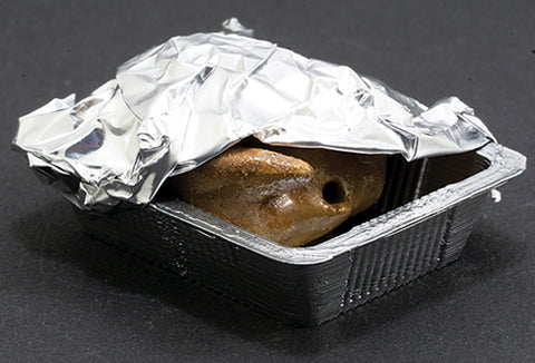 Foil Covered Turkey in a Pan