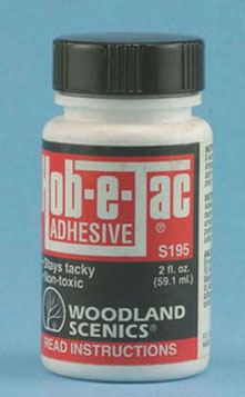 Woodland Scenics Hob-e-Tac Adhesive in a 2 fl. oz. bottle
