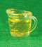 Measuring Cup Filled with Olive Oil