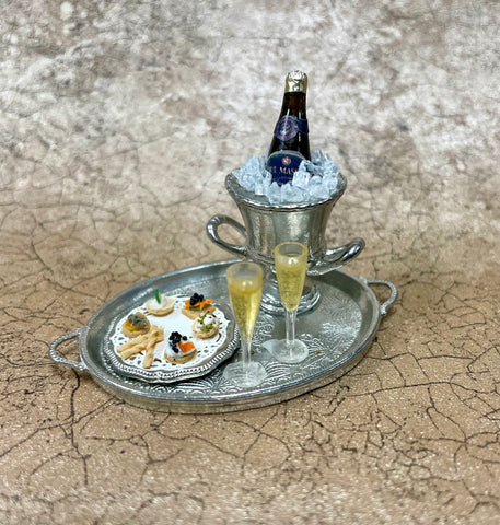 Champagne and Caviar on a Silver Tray