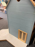 Partially finished dollhouse view from the right side