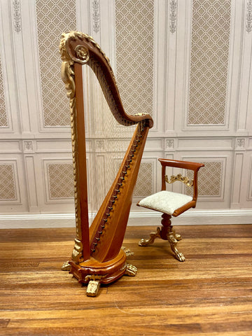 A 1:12 miniature scale harp and chair, with gilded walnut finish