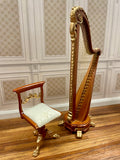 A 1:12 miniature scale harp and chair with a gilded walnut finish
