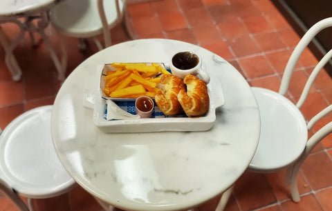 Croissant, Potatoes, Sauce, and Coffee on a Tray