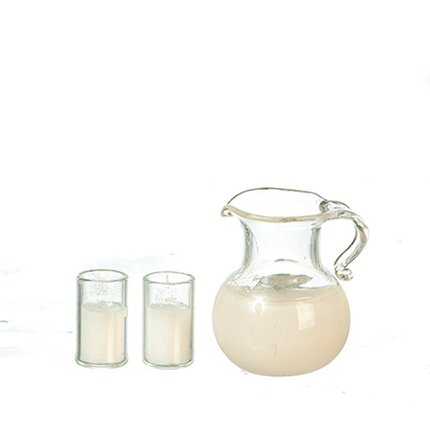 Pitcher of Milk and Pair of Filled Glasses