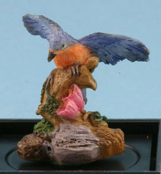 Bluebird on branch figurine by Jeannetta Kendall