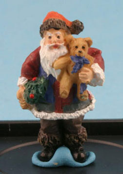 Santa with Teddy bear by Jeannetta Kendall