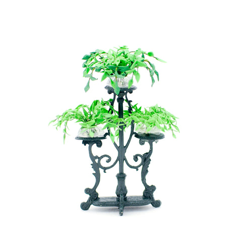 Green Triple Iron Plant Stand, empty.