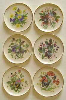 Set of Six Ceramic Plates, Floral Designs