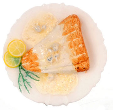 Salmon in White Sauce on Plate