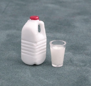 1/2 Gallon of Milk and Filled Glass