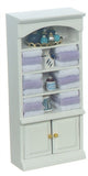 Bath Shelves with Purple Linens and Accessories