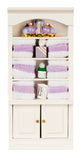 Bath Shelves with Purple Linens and Accessories