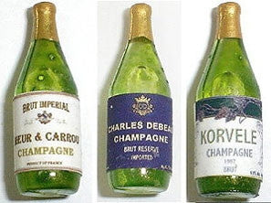 Set of Three Champagne Bottles