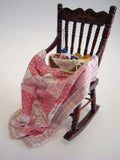Rocking Chair with Quilt